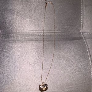 Rose gold hello Kitty locket